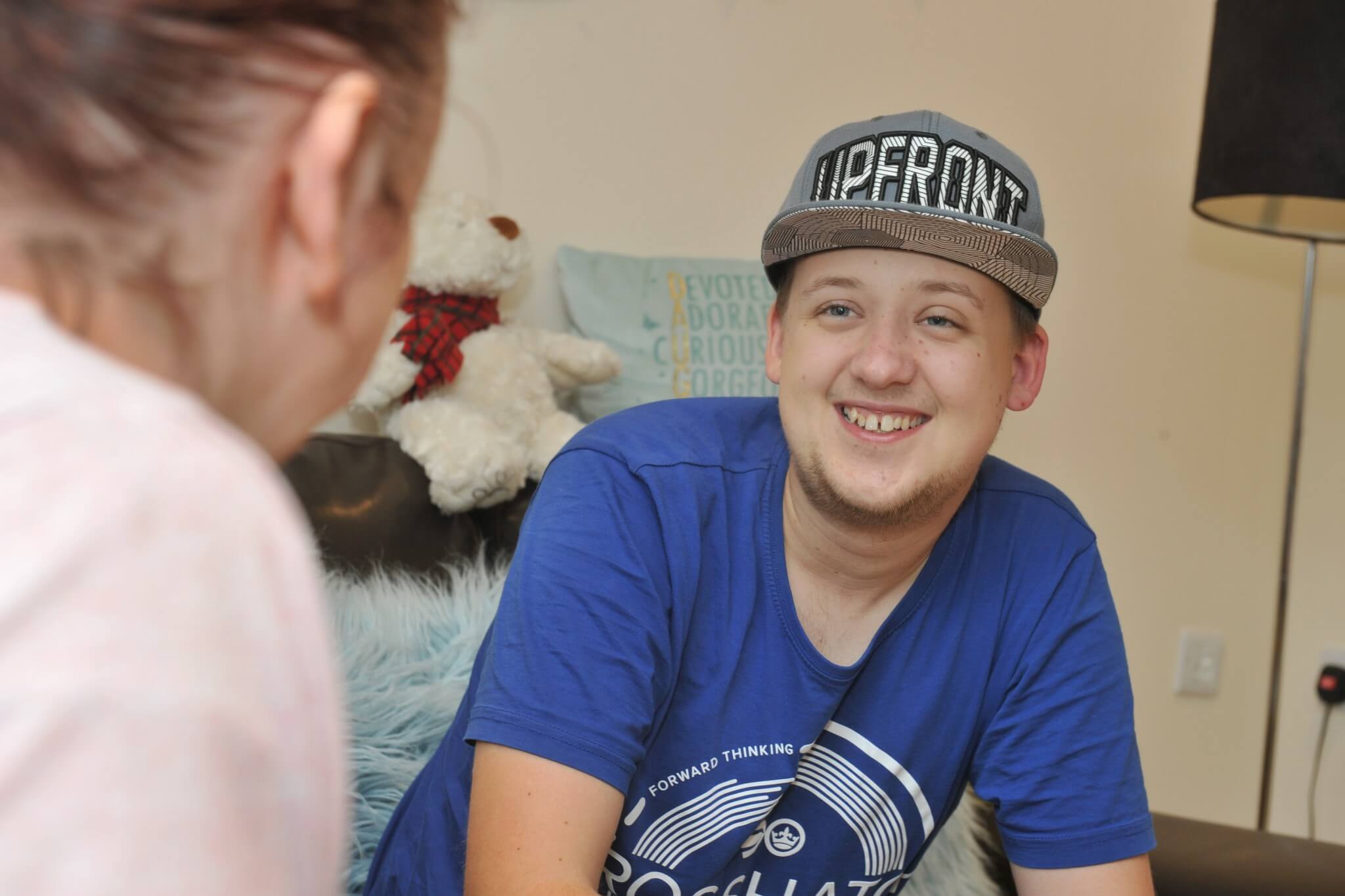 Smiling man in sports cap