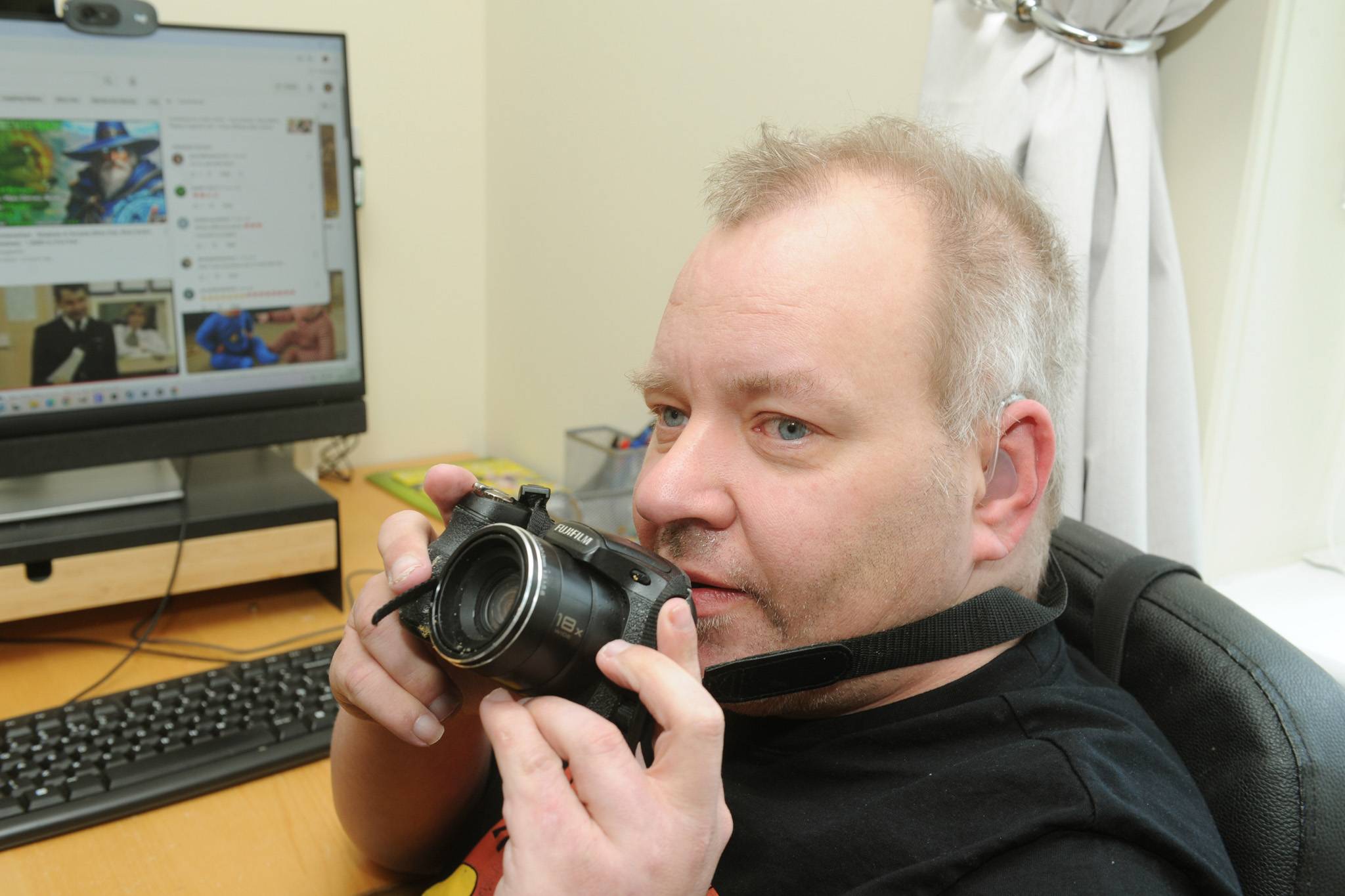 Kingdom House man with camera