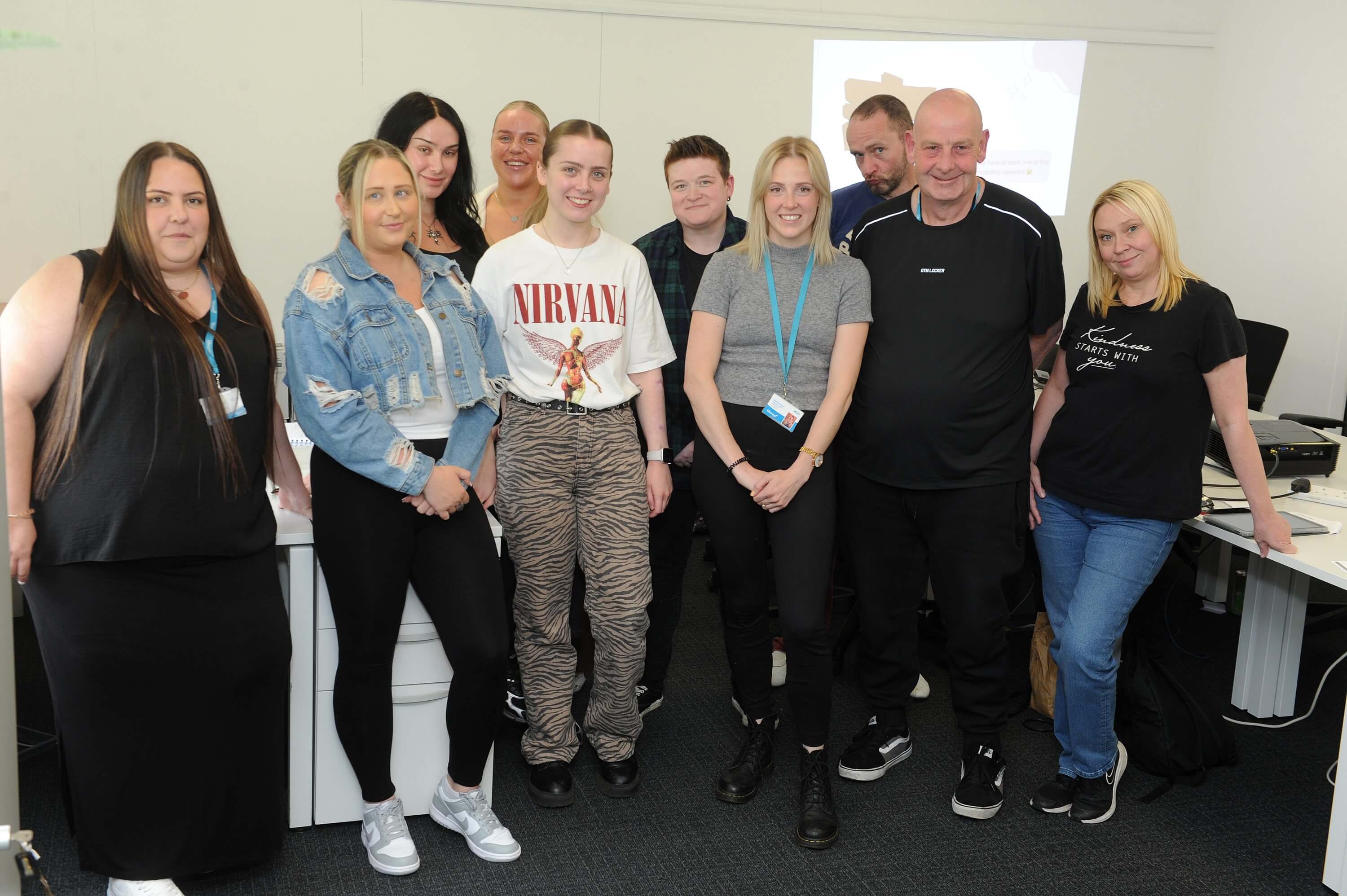 Jess - a person supported by Lifeways - with her staff team