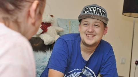 Smiling man in sports cap