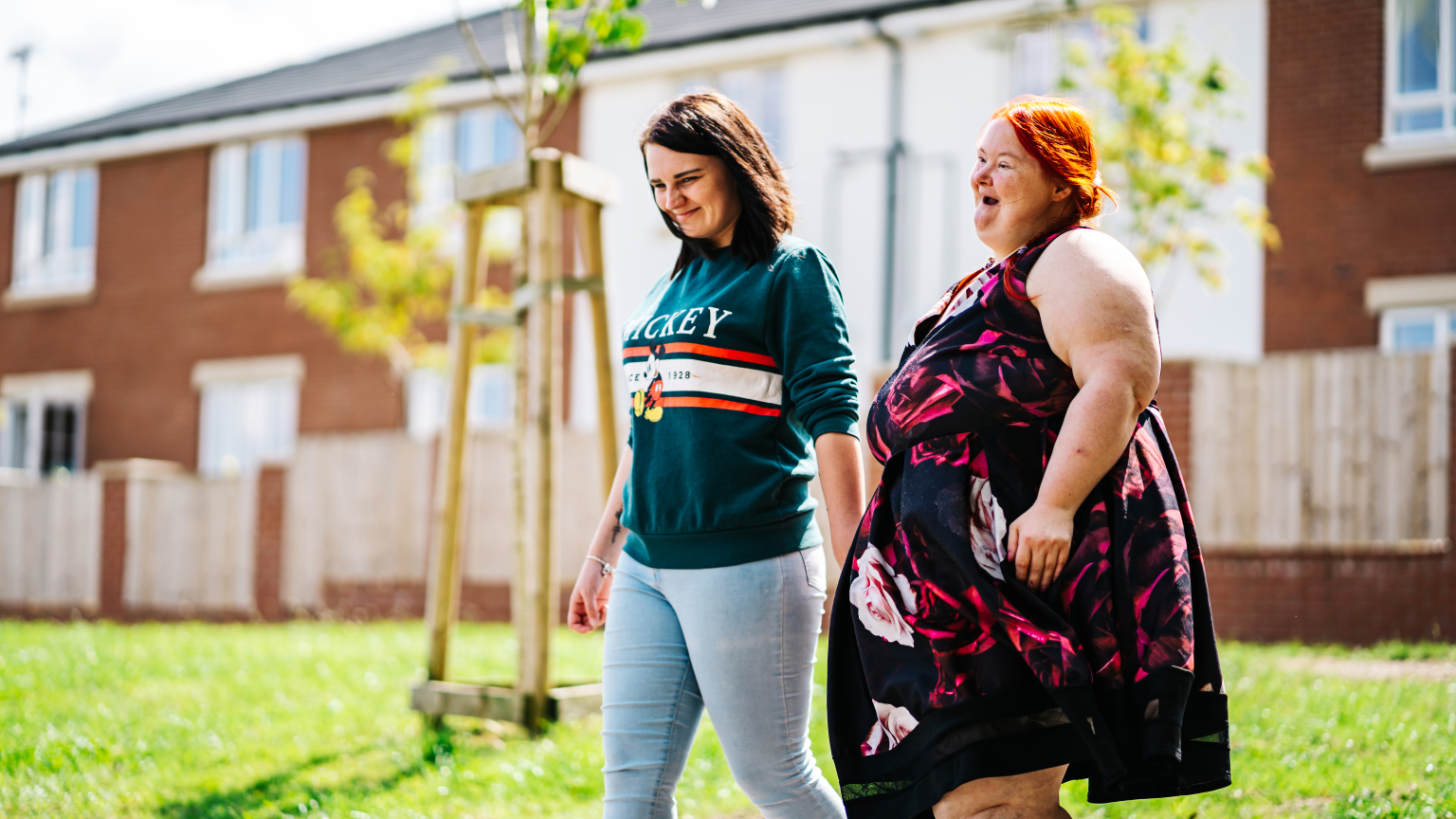 Service users walking in the garden