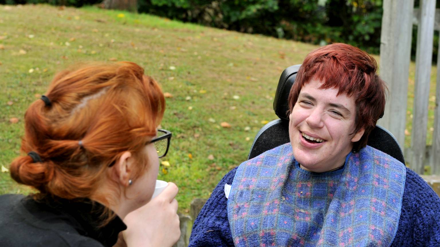 Service user outside in a wheelchair