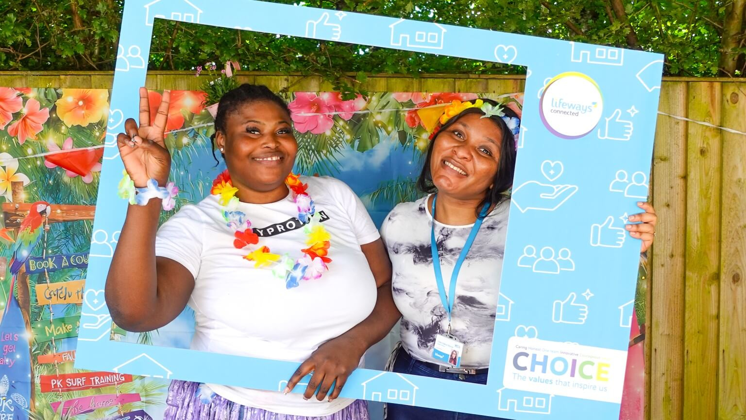 Two ladies celebrating at an event