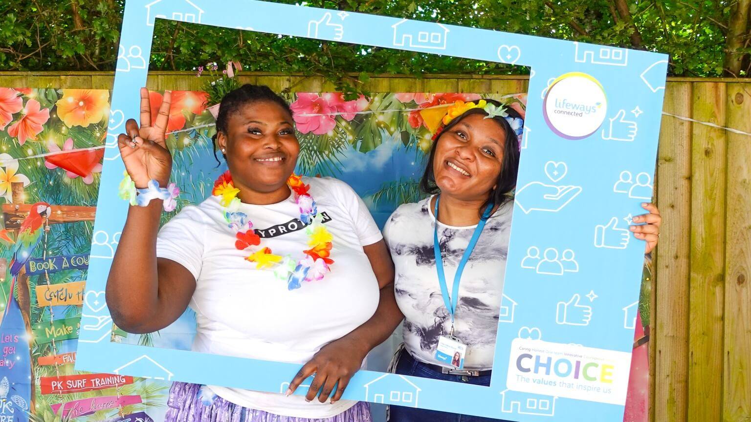 Two ladies celebrating at an event