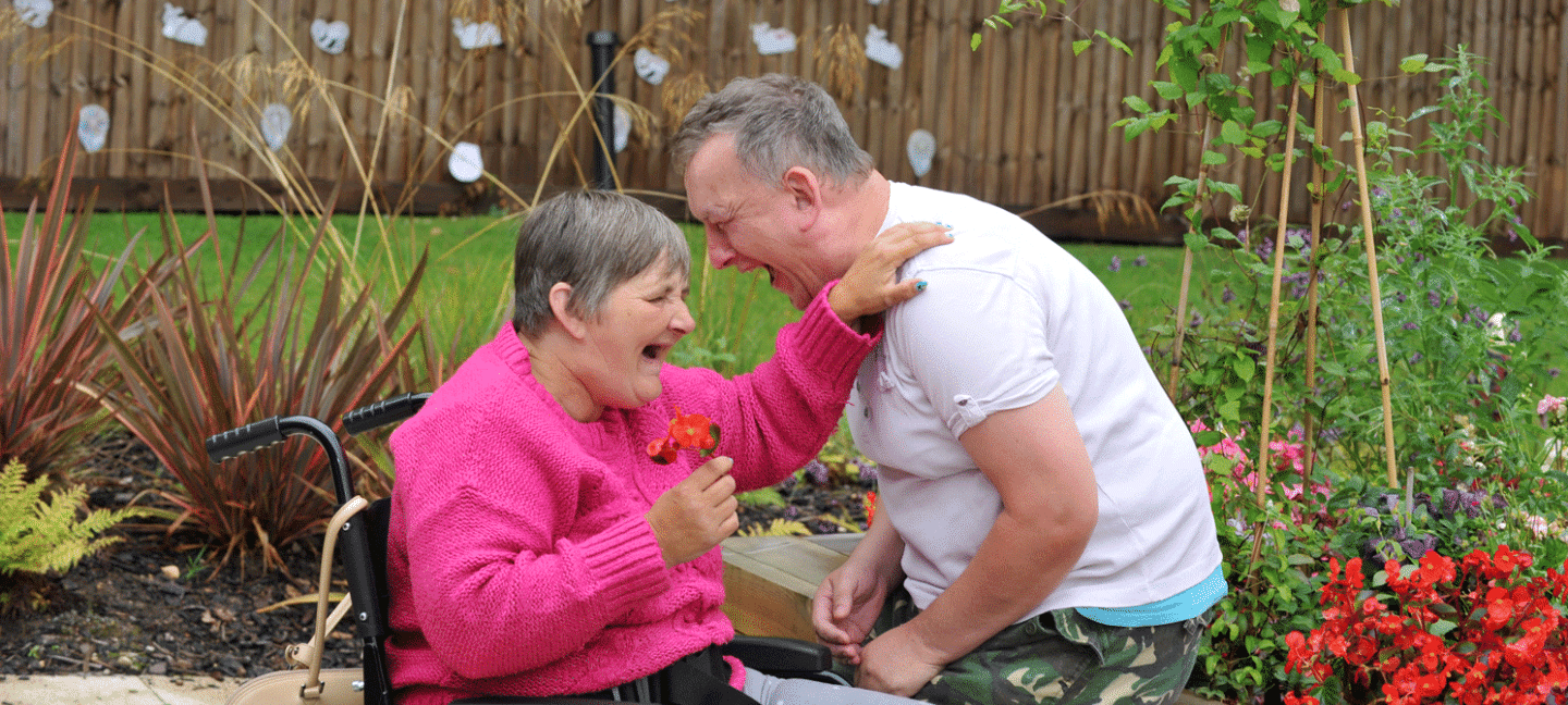 People laughing in the garden