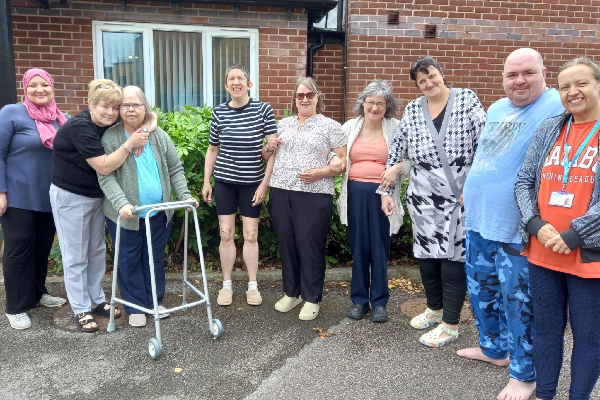 Lifeways staff and people they support outside a service in the East Midlands
