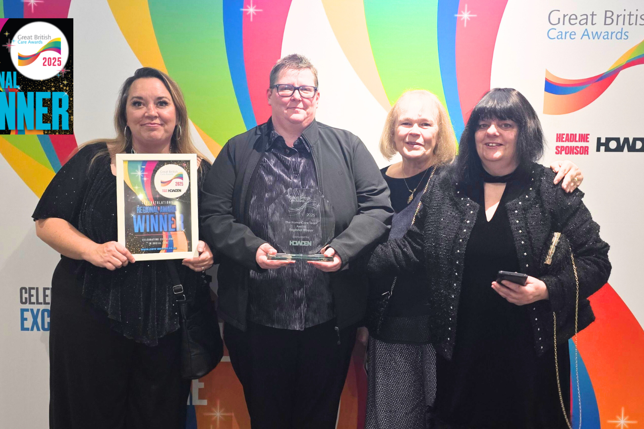 A team of people winning an award